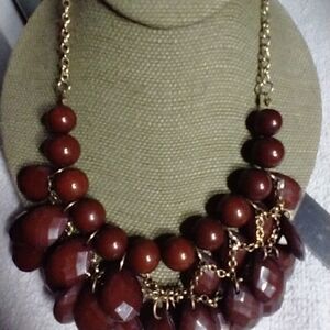 Brown beaded statement runway necklace